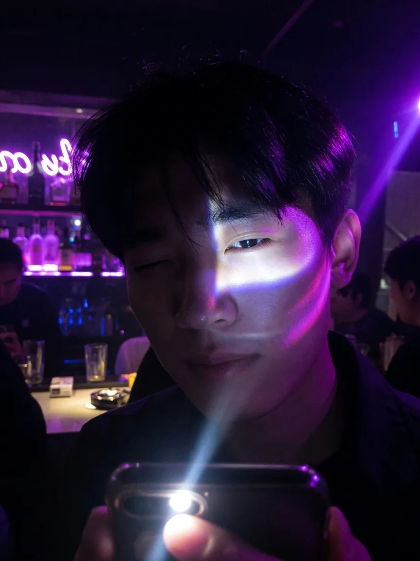 Neon glare selfie that fails face analysis lighting